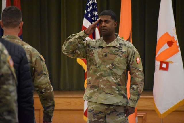 Command Sgt. Maj. Linwood Barrett, U.S. Army Signal School command sergeant major, renders a salute to Col. Paul Howard following his assumption of responsibility ceremony held Jan. 10 at Fort Gordon.
