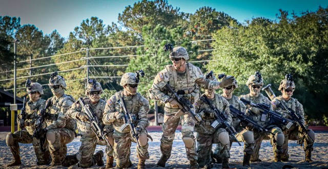 DS Mason from Bravo Company, 2nd Battalion, 58th Infantry Regiment leads trainees of Echo Company on 21 October 2022 at Fort Benning, GA.