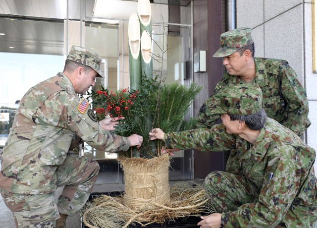 Command Sgt. Maj. David A. Rio, left, senior enlisted leader of U.S. Army Garrison Japan, participates in a &#34;Kadomatsu&#34; decoration event with Japan Ground Self-Defense Force members at Camp Zama, Japan, Dec. 8, 2022.  Rio recently reflected on his time in Japan after about a month in the position. 