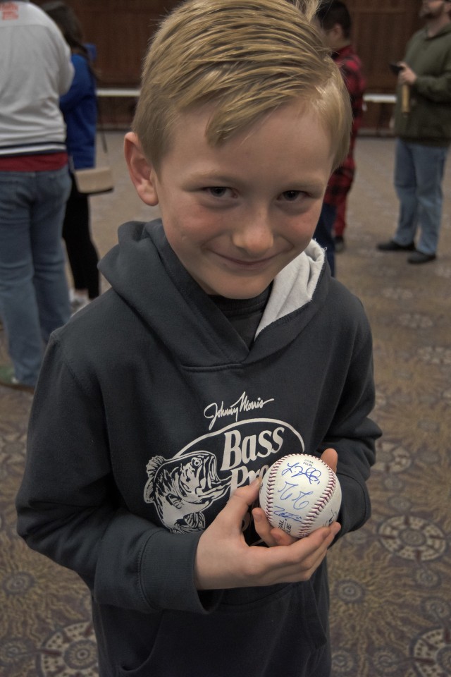 Eight-year-old William Lockwood shows off some of the autographs he was able to get on Saturday during a Cardinals Caravan event in the Engineer Regimental Room at Fort Leonard Wood’s John B. Mahaffey Museum Complex.