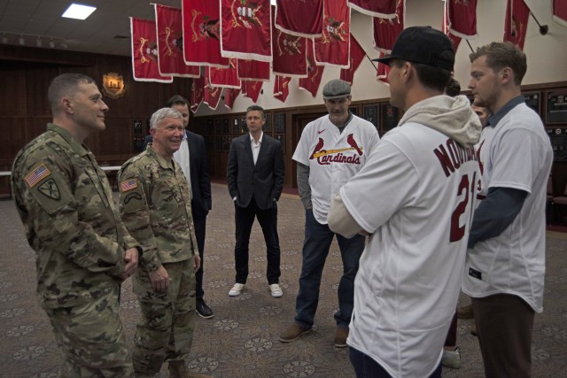 Maj. Gen. James Bonner, Maneuver Support Center of Excellence and Fort Leonard Wood commanding general (second from left), and U.S. Army Military Police School Regimental Command Sgt. Maj. Shawn Klosterman (left) speak with current and former St....