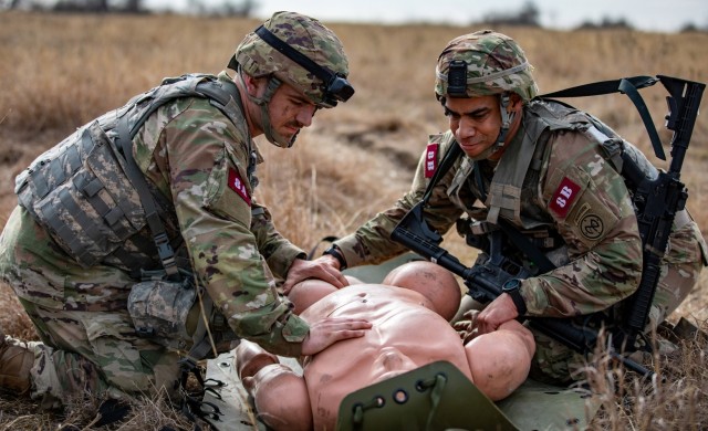 U.S. Army Sgt. Ethan Hart and Staff Sgt. Dylan Delamarter 2nd Battalion, 108th Infantry, 27th Infantry Brigade Combat Team, New York National Guard,  transport  a casualty during the Army&#39;s Best Medic Competition at Fort Hood, Texas on January 27, 2022. Twenty-two two-Soldier teams from all around the world traveled to Fort Hood, Texas to compete in the finals to be named the Army’s Best Medic. Hart and Delamarter represented the Army National Guard.  