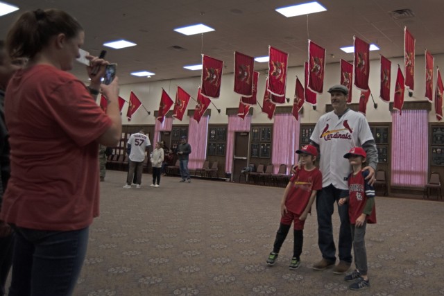 Former Cardinals pitcher Alan Benes poses for a photo with Brayden (left) and Declan Lewis on Saturday during a Cardinals Caravan event in the Engineer Regimental Room at Fort Leonard Wood’s John B. Mahaffey Museum Complex.