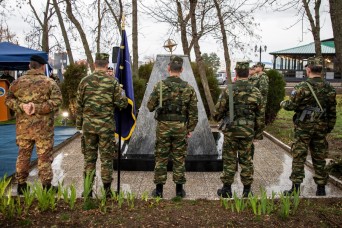 Kosovo Force (KFOR) Soldiers gather to pay tribute to their Slovak comrades who lost their lives in an airplane crash accident in 2006, while returning...