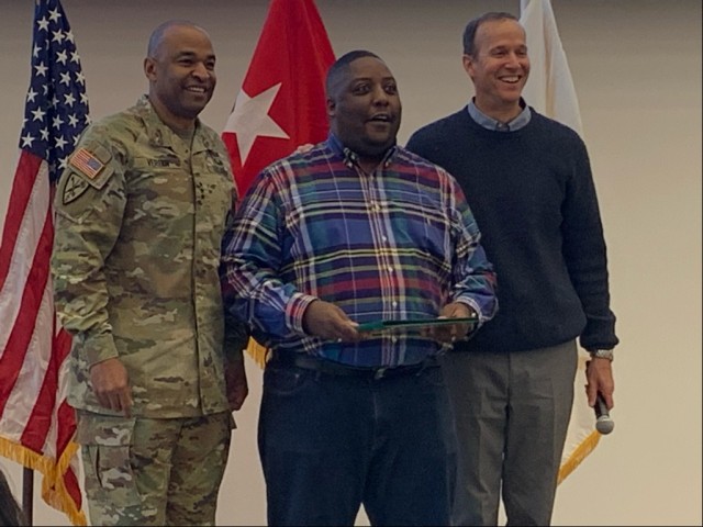 DCS, G-9 LTG Kevin Vereen joins Installation Services Director Michael Reheuser in presenting Employee of the Year award to Gregory Spann, November 2022.