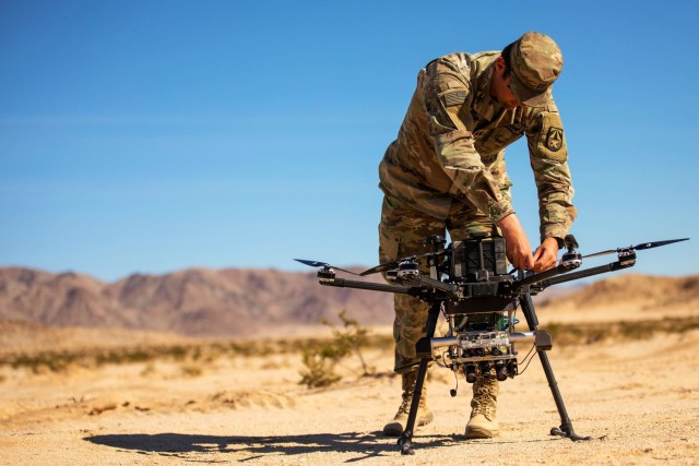 U.S. Army Cpt. Eric Tatum assigned to Artificial Intelligence Integration Center, Army Futures Command, conducts field testing with the Inspired Flight 3 Drone during Project Convergence 2022 at Ft. Irwin, California, Oct. 27, 2022. PC22...