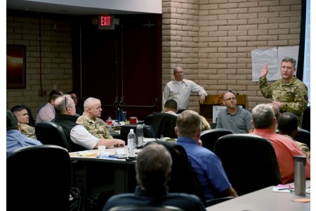 Col. Christopher Hickey (right), Army War College instructor, leads more than 40 senior leaders from the Army Test and Evaluation Command (ATEC) in a discussion on multidomain operations during a seminar at U.S. Army Yuma Proving Ground (YPG) on January 25, 2023. The seminar was part of YPG&#39;s Employee Modernization Effort for Relevant Growth and Enrichment (EMERGE) program, a comprehensive effort to prepare the workforce for the future test mission covering everything from developing new test methodologies for advanced technologies to leadership strategies and critical thinking.