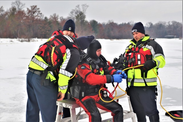Fort McCoy Fire Department dive team conducts ice rescue training at frozen lake at Fort McCoy