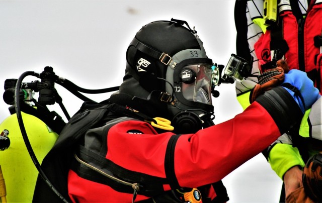 Fort McCoy Fire Department dive team conducts ice rescue training at frozen lake at Fort McCoy