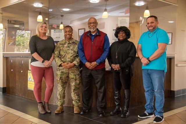 Staff members of the One Stop include, from left, Krystal Scott, primary site security manager; Pfc. Mya Hamilton; Ed Adams, human resource supervisor; Betty Anderson, retirement service officer; and Jose Rosario, assistant RSO. 