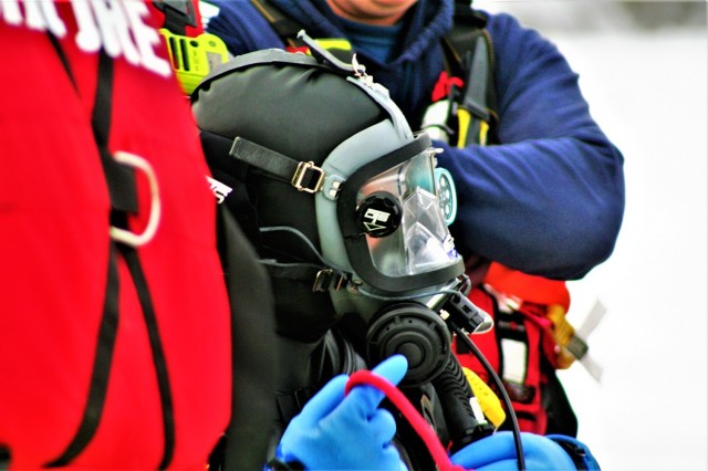 Fort McCoy Fire Department dive team conducts ice rescue training at frozen lake at Fort McCoy