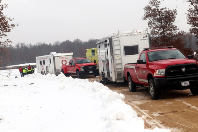 Fort McCoy firefighters hold ice rescue diving training at frozen-over installation lake