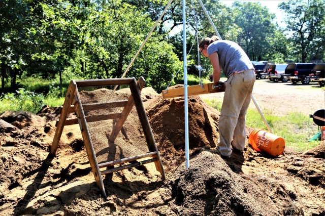 A member of the archaeology team with Colorado State University’s Center for Environmental Management of Military Lands under contract with Fort McCoy works at an active phase III archaeological dig July 6, 2017, on South Post at Fort McCoy,...