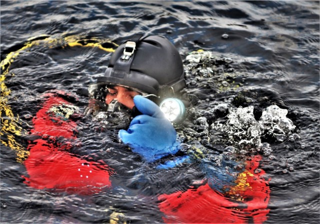 Fort McCoy Fire Department dive team conducts ice rescue training at frozen lake at Fort McCoy