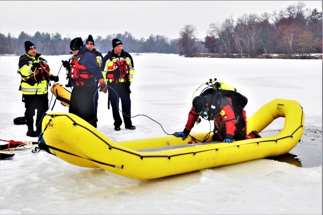 Fort McCoy Fire Department dive team conducts ice rescue training at frozen lake at Fort McCoy