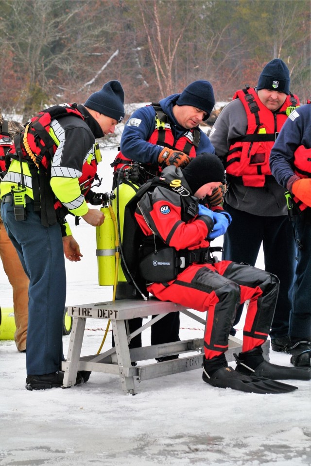 Fort McCoy Fire Department dive team conducts ice rescue training at frozen lake at Fort McCoy