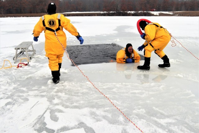 Fort McCoy firefighters train to save people clinging to ice with surface ice rescue training