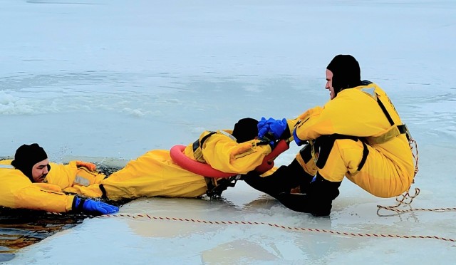 Fort McCoy firefighters train to save people clinging to ice with surface ice rescue training