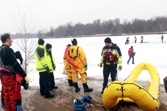 Fort McCoy firefighters hold ice rescue diving training at frozen-over installation lake