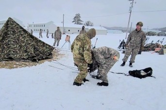 Photo Essay: Airmen learn to build Arctic 10-person tents during cold-weather training at Fort McCoy, Part II
