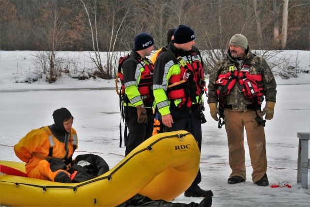Fort McCoy Fire Department dive team conducts ice rescue training at frozen lake at Fort McCoy