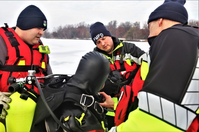 Fort McCoy Fire Department dive team conducts ice rescue training at frozen lake at Fort McCoy