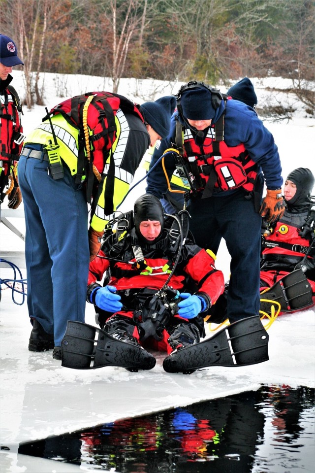 Fort McCoy Fire Department dive team conducts ice rescue training at frozen lake at Fort McCoy