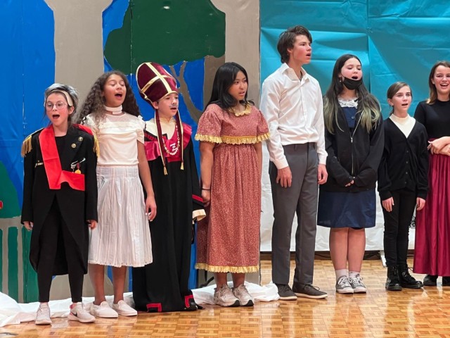 Cammy LeFebre, far left, a sixth grader at Arnn Elementary School, performs in Zama Middle High School&#39;s production of “Frozen Jr.&#34; in December 2022. Cammy and her sister, Sydney, also continue to pursue more opportunities in Japan&#39;s modeling world.