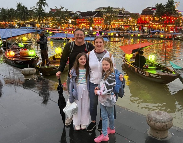 Henry and Jami LeFebre pose for a photograph with their daughters, Cammy and Sydney, while on vacation at Hoi An, Vietnam, in December 2022. Both daughters continue to pursue opportunities in Japan&#39;s modeling world.