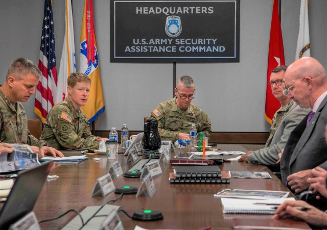 (From left) Brig. Gen. Brad Nicholson, the U.S. Army Security Assistance Commanding General, briefs Maj. Gen. Donn Hill, the U.S. Army Security Force Assistance Commanding General, January 31, 2023 at Redstone Arsenal. USASAC develops and manages security assistance programs and foreign military sales cases to build partner capacity, support combatant command engagement strategies and strengthen U.S. global partnerships. SFAC mans, trains and validates the Army&#39;s Security Force Assistance Brigades for employment by combatant commands. Also in attendance as the two officers discussed the synergy between their organizations was USASAC&#39;s Command Sgt. Maj. Stephen Burnley (right) and members of USASAC&#39;s staff sections.