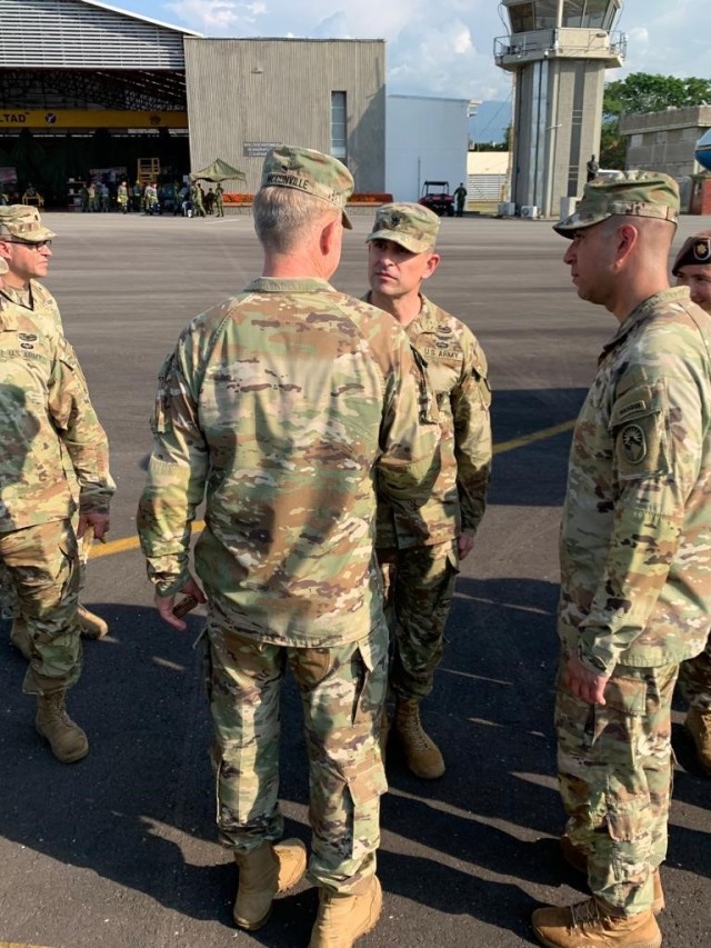 The 40th Chief of Staff of the Army, Gen. James C. McConville, visited Deputy Commander of the Colombian Army Maj. Gen. Juan Vicente Perez Duran at Tolemaida Air Base, Colombia, Jan. 30, 2023.  While there, McConville met with U.S. country teams and presented a coin of appreciation to Lt. Col.  Adrian Villa for his work building partner capacity in South America. Villa leads the aviation technical assistance field team for the U.S. Army Security Assistance Training Management Organization (SATMO). A critical component of U.S. foreign policy, SATMO forms, trains, and employs security assistance teams tasked with increasing partner capability and capacity worldwide to meet Geographic Combatant Command requirements.