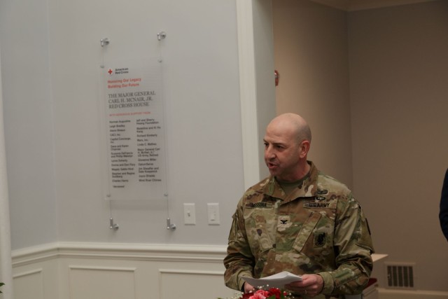 Col. Joseph Messina, Fort Belvoir Garrison commander, addresses attendees at the Red Cross unveiling of the Maj. Gen. Carl H. McNair Jr. Red Cross House, Jan 26. The dedication remembered McNair as an Army aviator with a lifetime of service to the Red Cross, who died last year. 