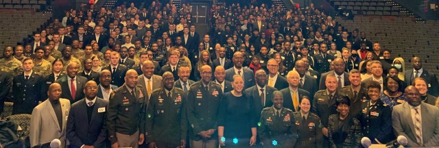 Panelists and attendees pose for a photo at the Feb. 2, 2023 Howard University event in which Army general officers engaged ROTC and JROTC cadets on Army career questions.