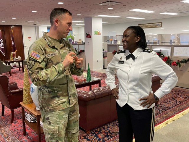 Lt. Gen. Telita Crosland, director of the Defense Health Agency, talks with one of her coworkers before taking her new position. As the director of DHA, she leads a joint, integrated medical system of more than 700 hospitals and clinics and a...
