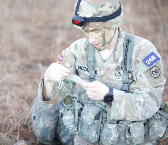 Sgt. Klayton McCallum, a member of the New York Army National Guard&#39;s 2nd Battalion, 108th Infantry, checks a casualty tag during  an event at the Army Best Medic Competition on January, 24, 2023 at Fort Polk Louisiana. McCallum and Sgt. Thomas Mulhern, also a member of the 108th Infantry represented the Army National Guard during the competition. ( U.S. Army Photo by Sgt. Terry Vongsouthi)