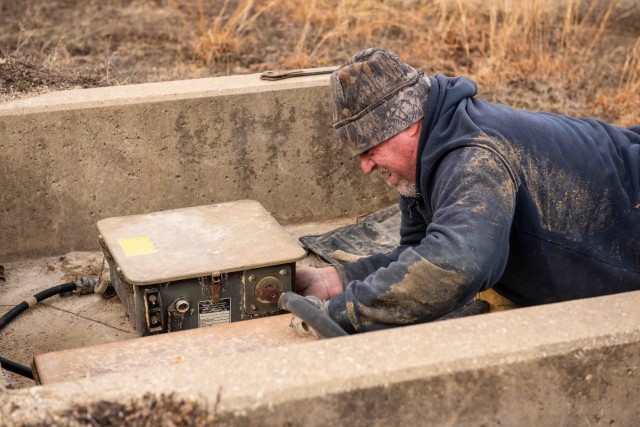 Range Technician John Snider works to dismantle an old target in preparation for the installation of a new target system Feb. 1 at Range 20.