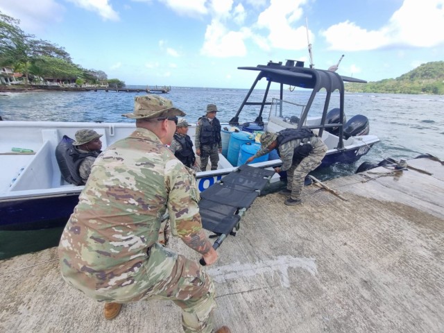 Sgt. 1st Class Nino Cintron trains members of the Panamanian Tactical
Anti-Drug Operations Unit (UTOA) on best practices for transferring a litter from watercraft during a training exercise in Colon, Panama. Cintron, a member of the Security Assistance Training Management Organization (SATMO), was part of a Technical Assistance Field 
Team (TAFT) deployed to provide Riverine Operations Training ending on Feb. 3. SATMO&#39;s security assistance professionals support the Joint Force and Interagency around the globe, operationalizing FMS and implementing training solutions in support of America&#39;s allies and partners. 
