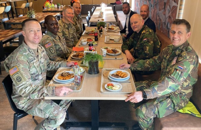 U.S. and Dutch forces break bread, discuss combined maintenance operations at APS-2 site