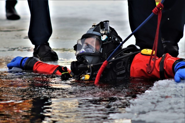 Fort McCoy Fire Department dive team conducts ice rescue training at frozen lake at Fort McCoy