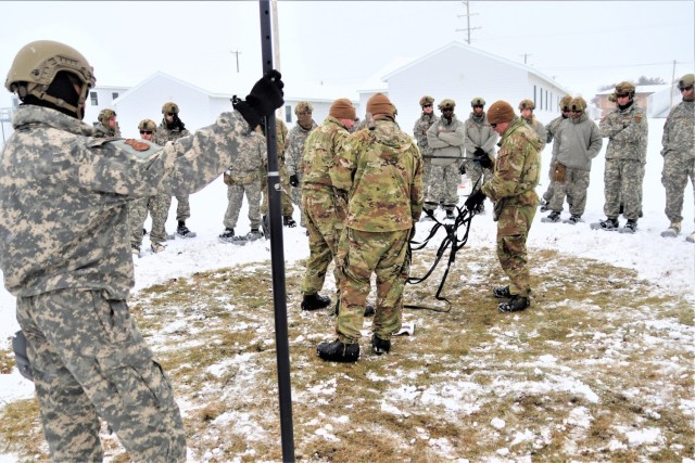 Tent-building among skills Airmen learned during January cold-weather training at Fort McCoy