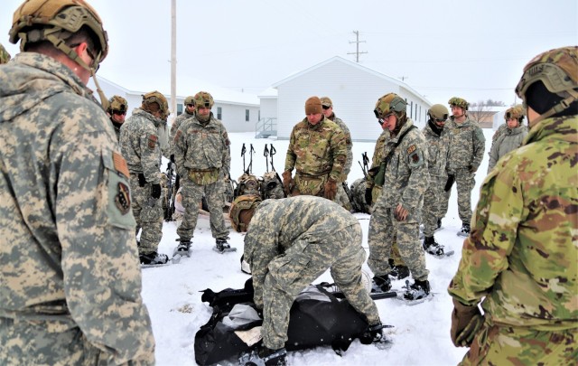 Tent-building among skills Airmen learned during January cold-weather training at Fort McCoy