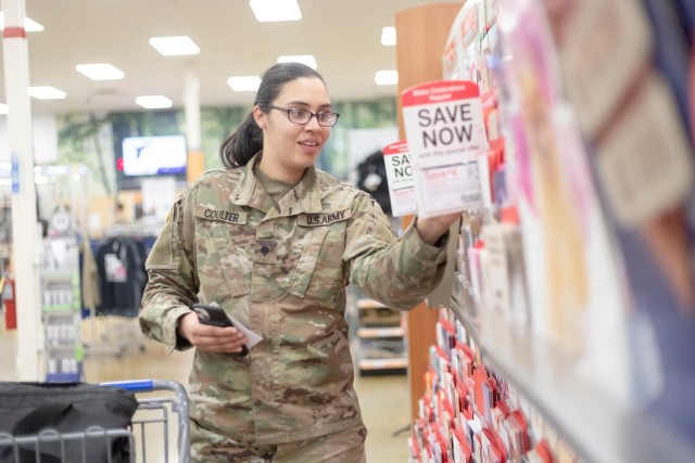 Soldier clips on: 11th ADA Bde. Soldier saves at the register, helps others