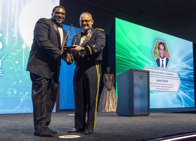 BEYA Career Achievement in Government Award winner Lamar Garrett, pictured with Maj. Gen. Miles Brown, both of DEVCOM.