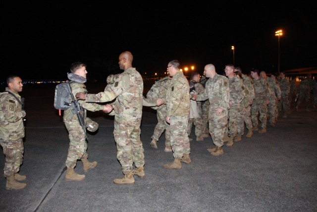 Soldiers, families, and loved ones of the 542nd Support Maintenance Company participate in a Welcome Home ceremony as the units returns to Joint Base Lewis-McChord, Feb. 14, 2023. The company deployed for nine months in support of Operation...