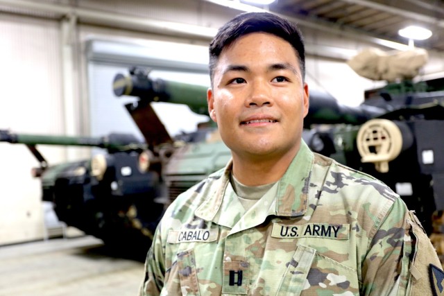Capt. Joseph Cabalo, operations officer, Army Field Support Battalion-Northeast Asia, discusses Army Prepositioned Stocks-4 operations at Camp Carroll, Republic of Korea