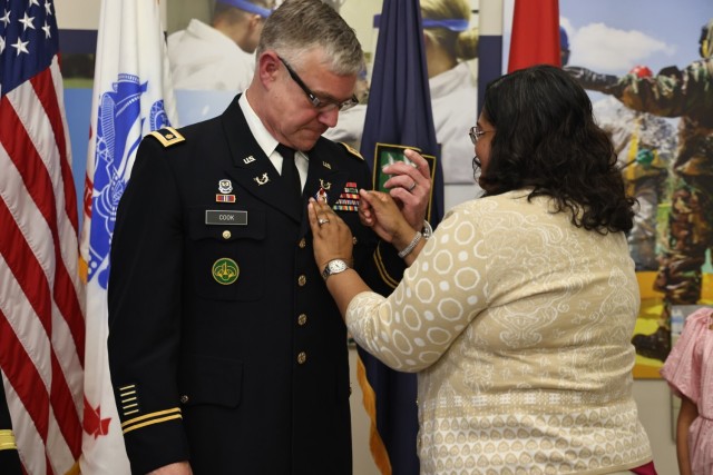 Linda Amarsingh and Maj. William J. Cook III