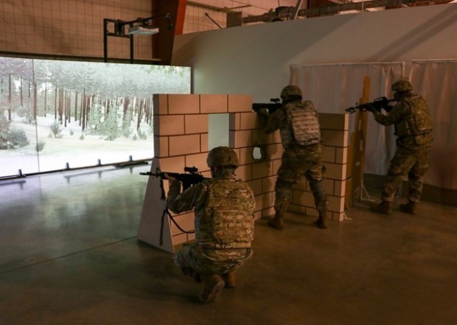 A group of soldiers with the 1st Theater Sustainment Command (TSC), run through tactical drills in the squad advanced marksmanship trainer (SAM-T) Jan 9th, 2020 in Fort Knox, Ky. (U.S. Army Photo by Spc. Zoran Raduka)