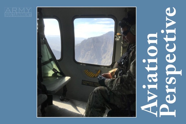 Warrant Officer 5 Rolando Sanchez conducts a predeployment site survey on board a UH-60 Black Hawk in Afghanistan on April 19, 2019. 