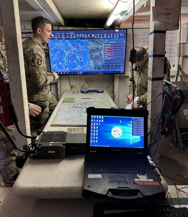 Soldiers with the 2CR demonstrate the Command Post Computing Environment (CPCE) on February 5, 2023, within the Tactical Operations Center during Ops Demo Phase 2, as part of the unit’s Dragoon Ready exercise in Hohenfels, Germany  CPCE provides a complete operational picture of the battlefield for the commander’s situational awareness. 