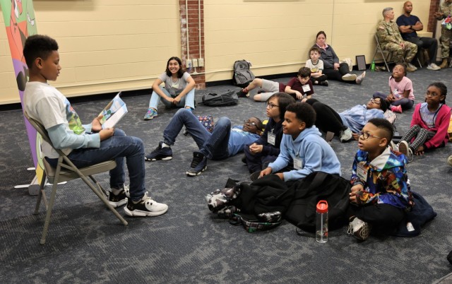 Scott Intermediate School student author Chance Brown reads from his published book, “Attack on Blobville: The Return of Bydoom” during an in-person reading event Feb. 23, 2023 at Barr Memorial Library.